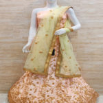 Gleaming Peach Colored Party Wear Silk Lehenga